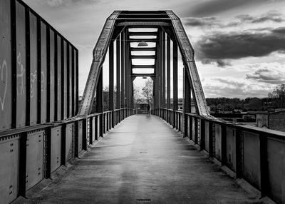 View of bridge against cloudy sky