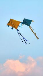 Low angle view of kite against sky