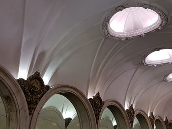 Low angle view of illuminated ceiling