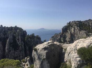 View of the riou island and archipelago from the steep cliffs of the calanque d'en vau in marseille.