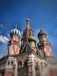 Low angle view of traditional building against blue sky