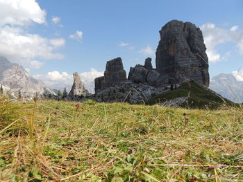 Scenic view of rocks and mountains against sky