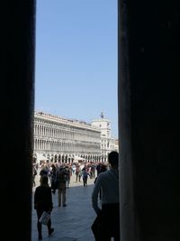 People in front of historical building