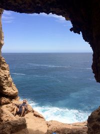 Scenic view of sea against clear blue sky