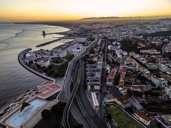 High angle view of highway in city during sunset