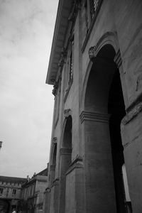 Low angle view of historic building against sky