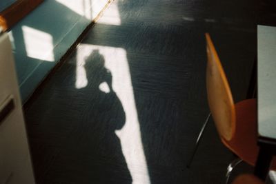 Close-up of shadow on table