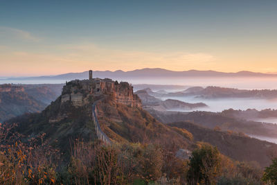 Scenic view of town on mountain peak