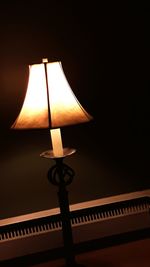 Low angle view of illuminated lamp post