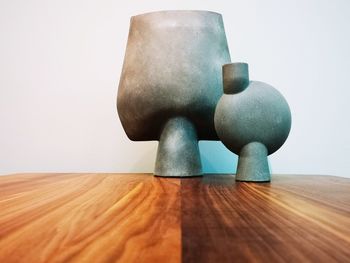 Close-up of stuffed toy on table against white background