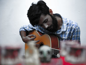 Young man playing guitar