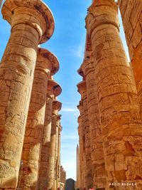 Low angle view of old temple against sky