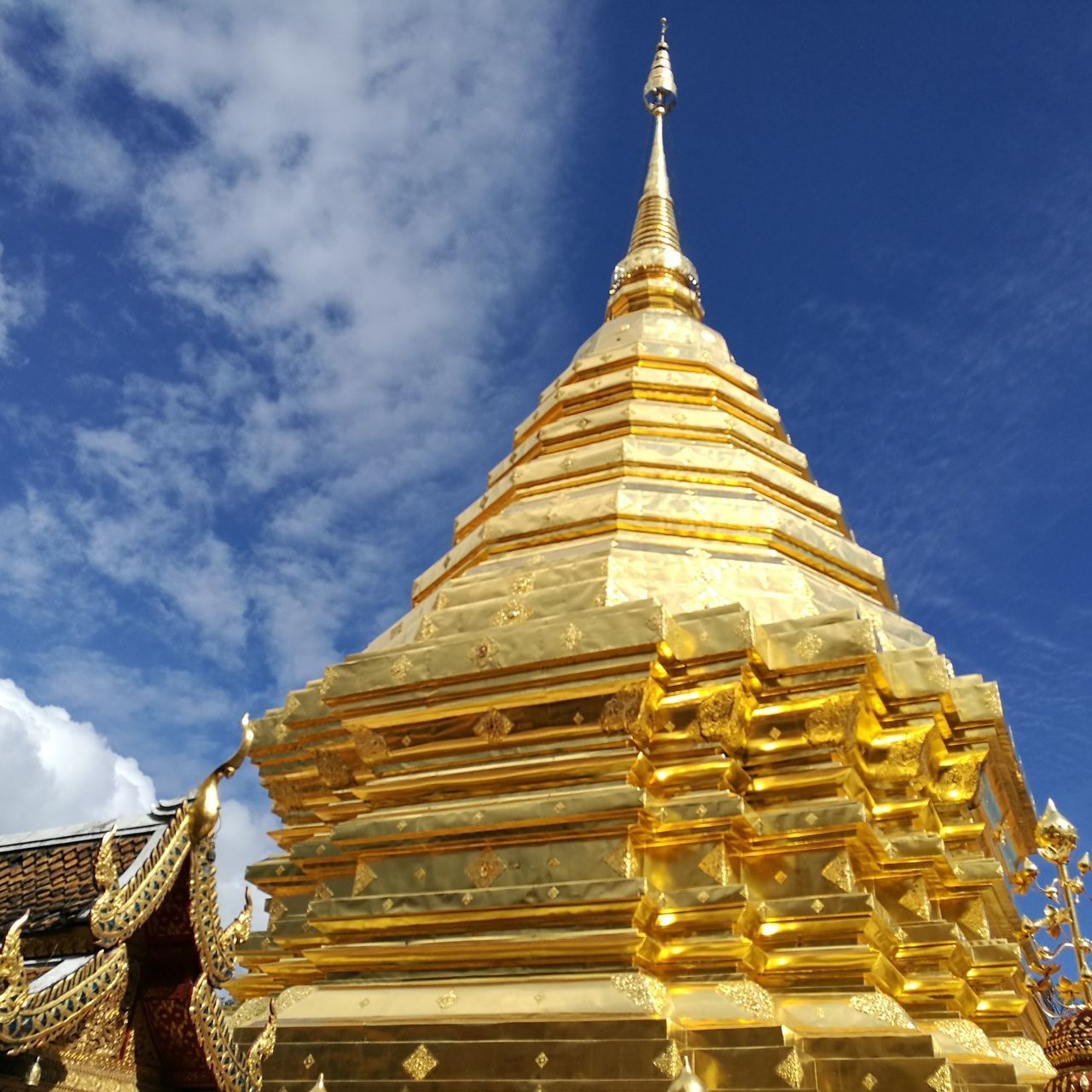 LOW ANGLE VIEW OF PAGODA AGAINST BLUE SKY