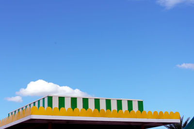 Low angle view of building against blue sky