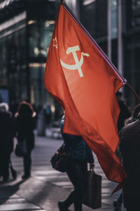 People walking on street in city