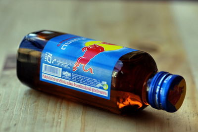 Close-up of blue bottle on table