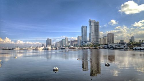 View of city buildings against sky