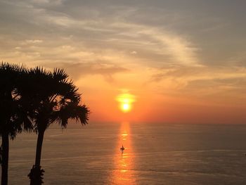 Scenic view of sea against sky at sunset