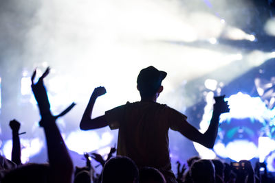 People enjoying at music concert