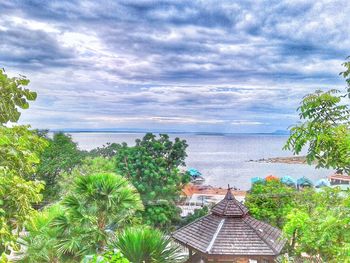 Scenic view of sea against cloudy sky