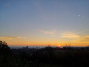 Scenic view of silhouette landscape against sky during sunset