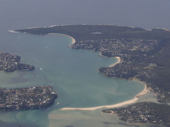 High angle view of sea and cityscape
