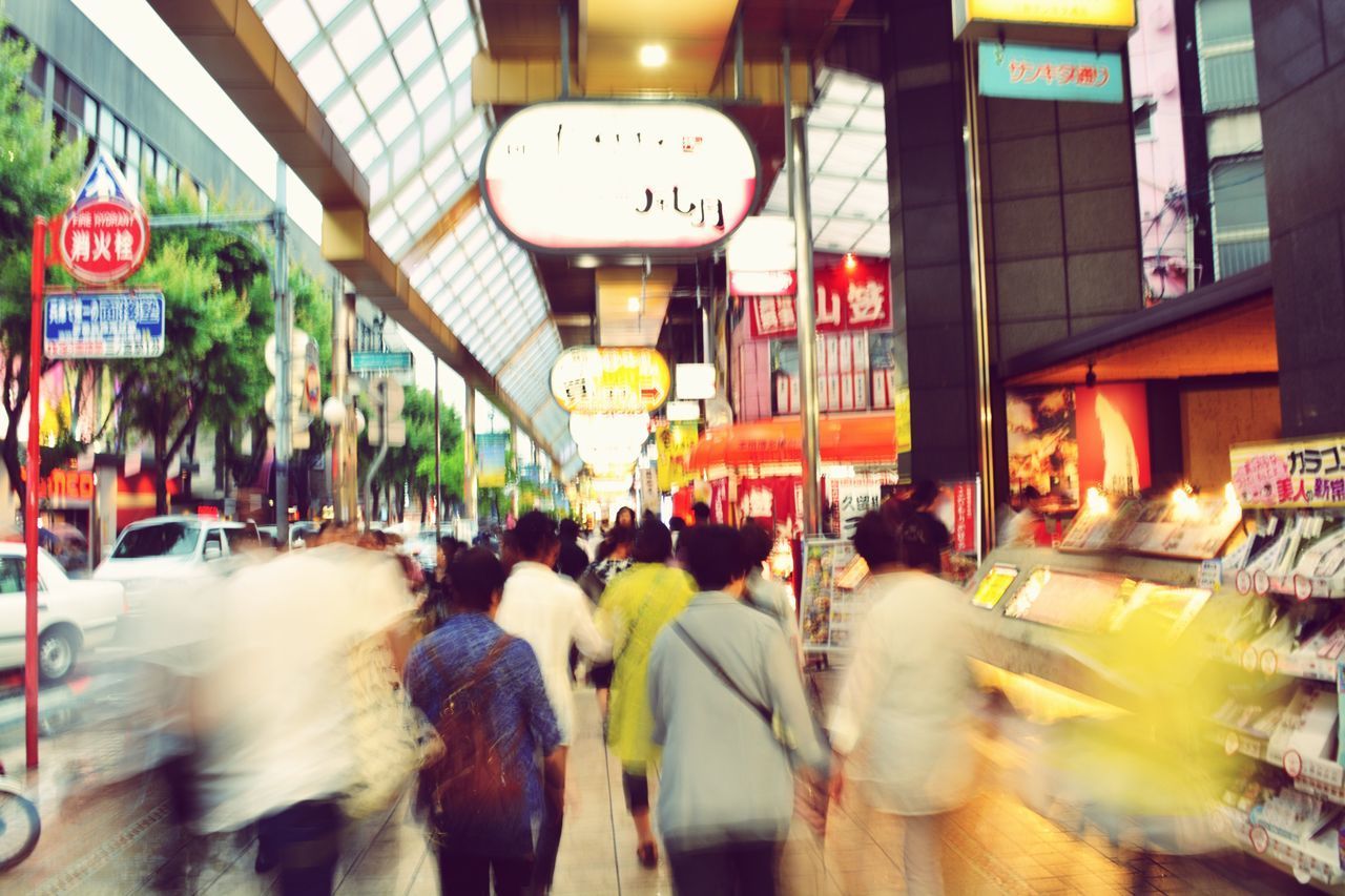 PEOPLE ON CITY STREET