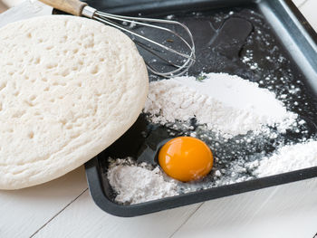 High angle view of egg in container