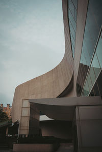 Low angle view of modern buildings against sky