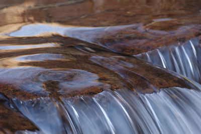 Close-up of water flowing through rocks