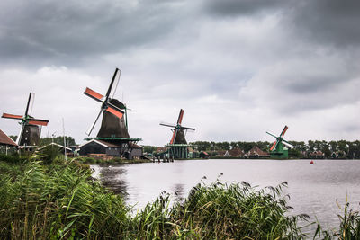 Traditional windmill against sky