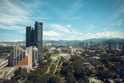 High angle view of modern buildings against sky