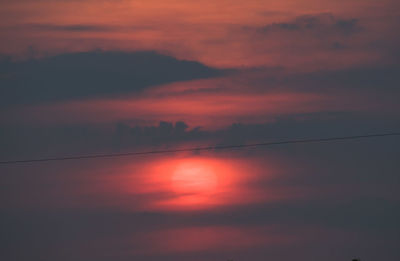 Scenic view of dramatic sky during sunset