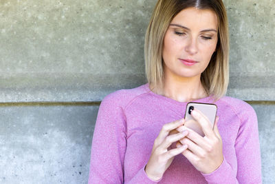 Young woman using mobile phone