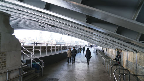 View of people walking on bridge