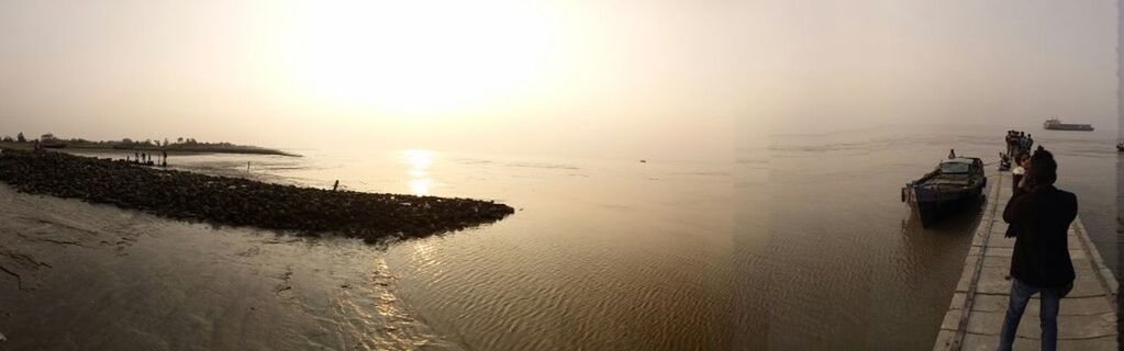 water, sky, sea, sunset, land, beach, scenics - nature, nature, beauty in nature, horizon, sun, tranquil scene, tranquility, horizon over water, sand, sunlight, reflection, motion, travel destinations, outdoors