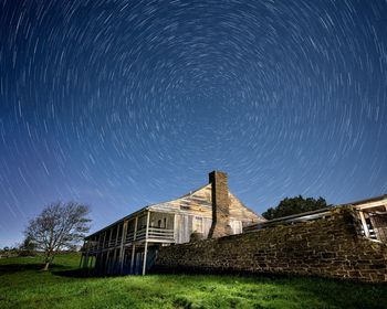 Low angle view of building against clear blue sky