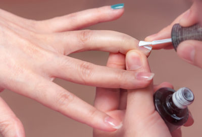 Close-up of woman holding hands