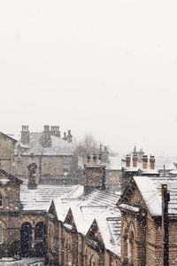 City against clear sky during winter