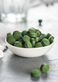 Close-up of green salad in bowl on table