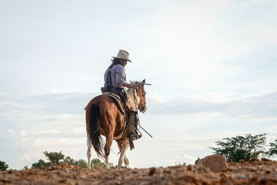 View of horse riding