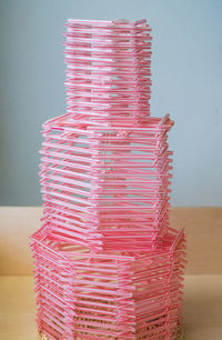 Close-up of pink stack on table