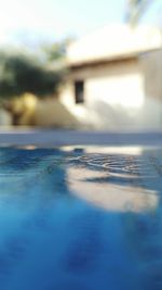 Close-up of swimming pool against sky