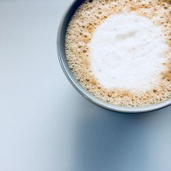 High angle view of coffee cup on table