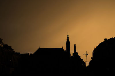 Silhouette of buildings at sunset