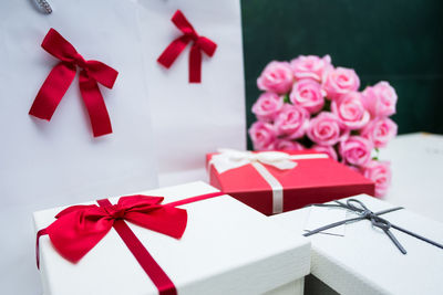 Close-up of red bouquet on white table