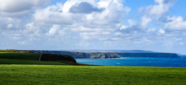 Scenic view of land against sky