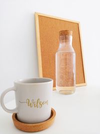 Close-up of coffee cup against white background