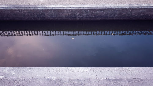 High angle view of swimming pool by lake