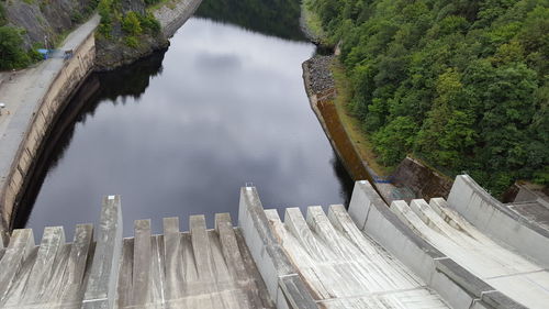 High angle view of dam by lake